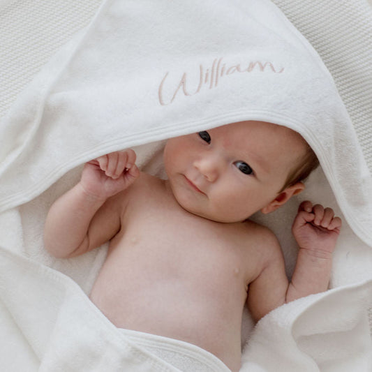 White hooded baby bath towel personalised with babyname