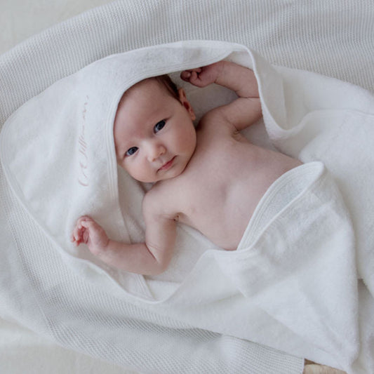 White hooded baby bath towel personalised with babyname