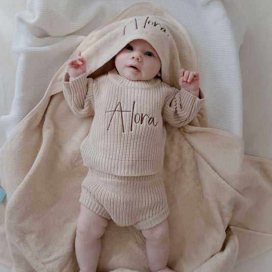 Beige hooded bath towel embroidered with baby name