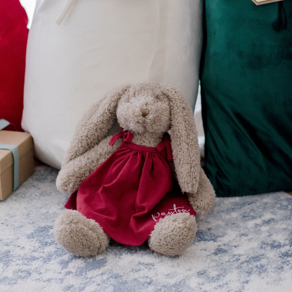 Nana Huchy Christmas bunny wearing a ruby red dress