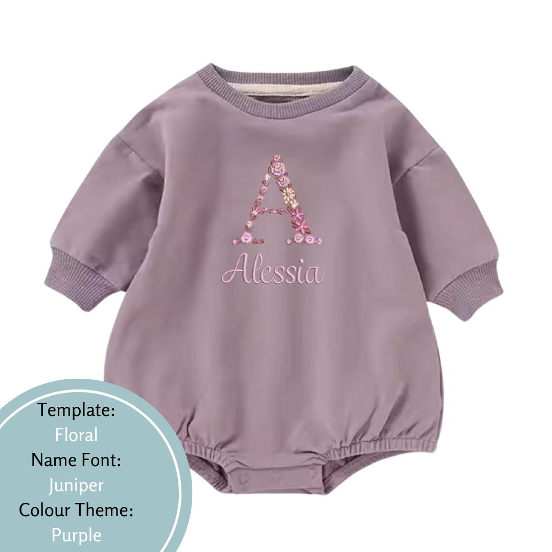 purple bubble romper with floral name design embroidered in a purple theme