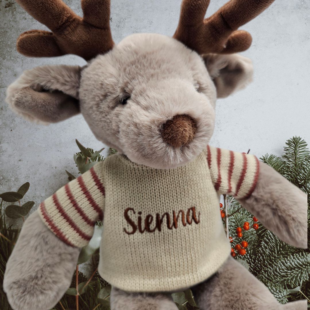 Soft Brown reindeer wearing a knit jumper personalised with name embroidery