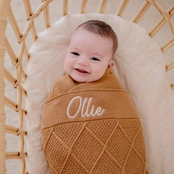 Tan brown diamond knit blanket with personalised baby name embroidered in white thread