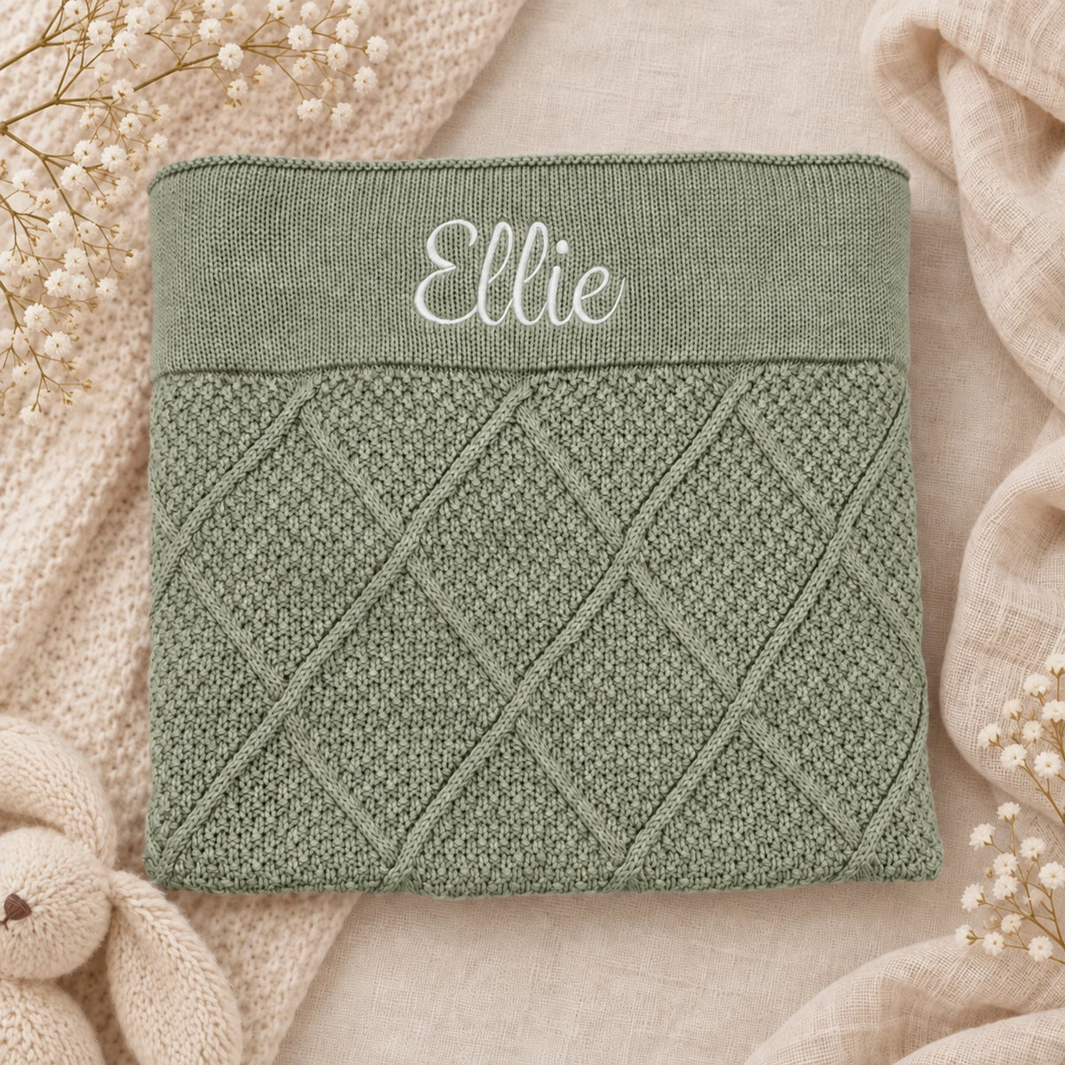 Sage Green Diamond Knit Bassinet Blanket with Ellie embroidered in Juniper font, white thread