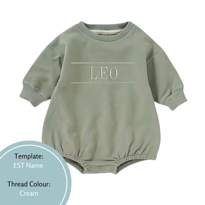 khaki green bubble romper embroidered with est date in cream thread